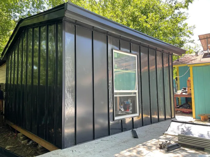 Black standing seam metal wall panels for Roof Inspection in Pullman